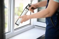 man-caulking-window-frame-840x560-75